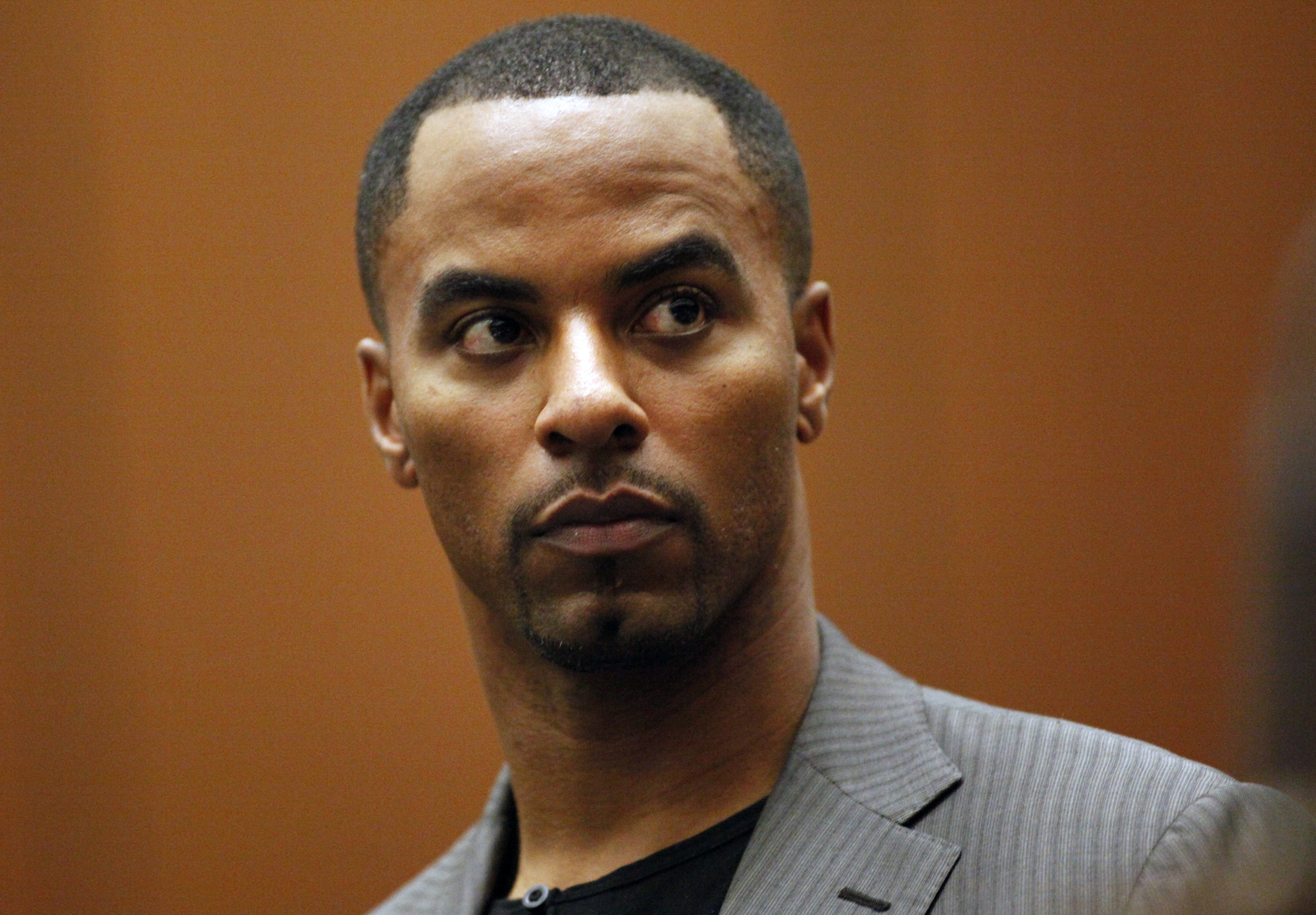 Ex-NFL star Darren Sharper sentenced to 18 years prison for