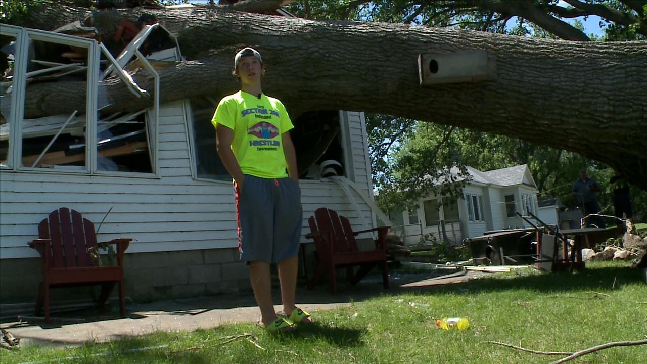 Teen survives tree crushing cabin in southern MN