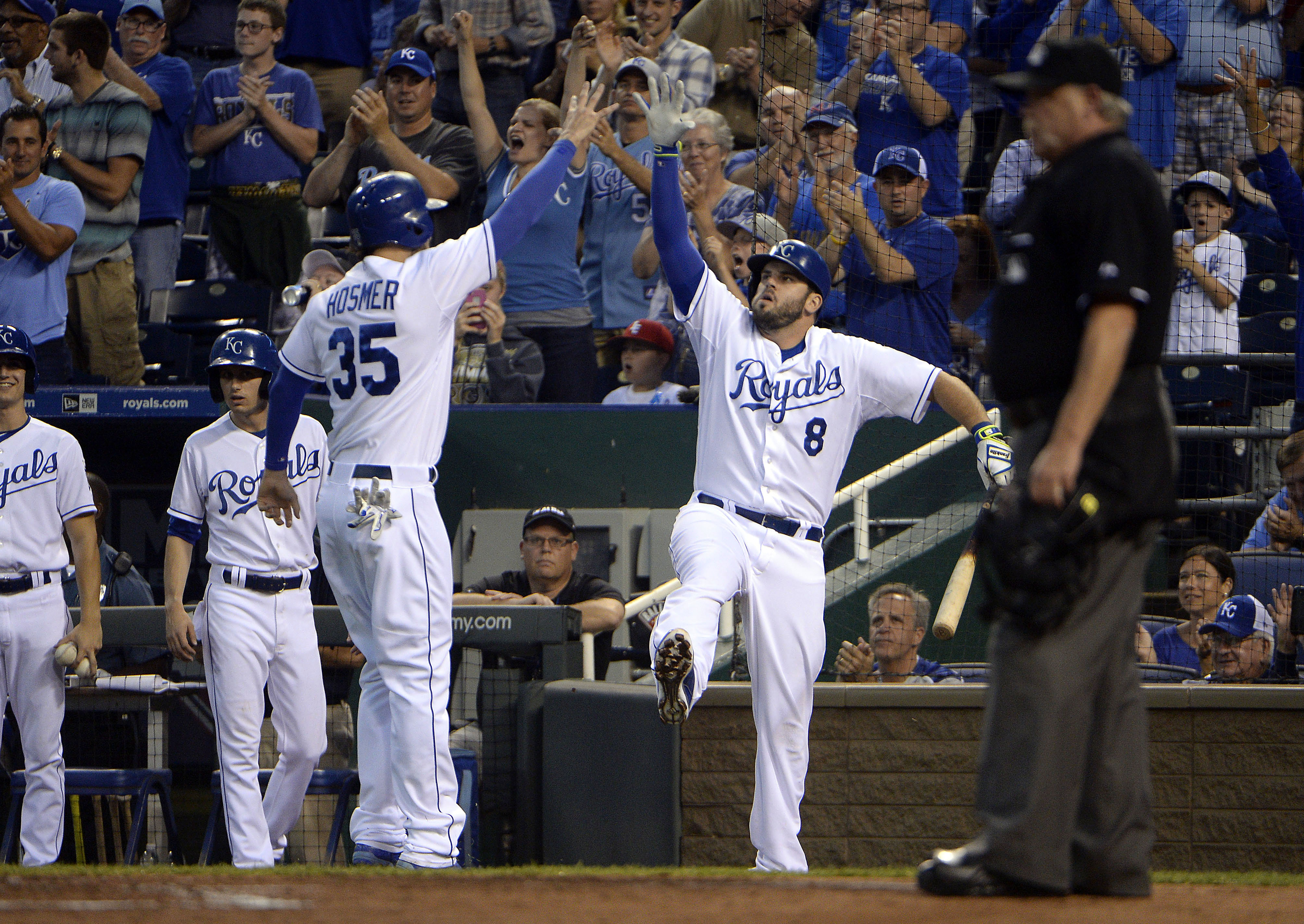 Kansas City Royals third baseman Mike Moustakas (8) and first