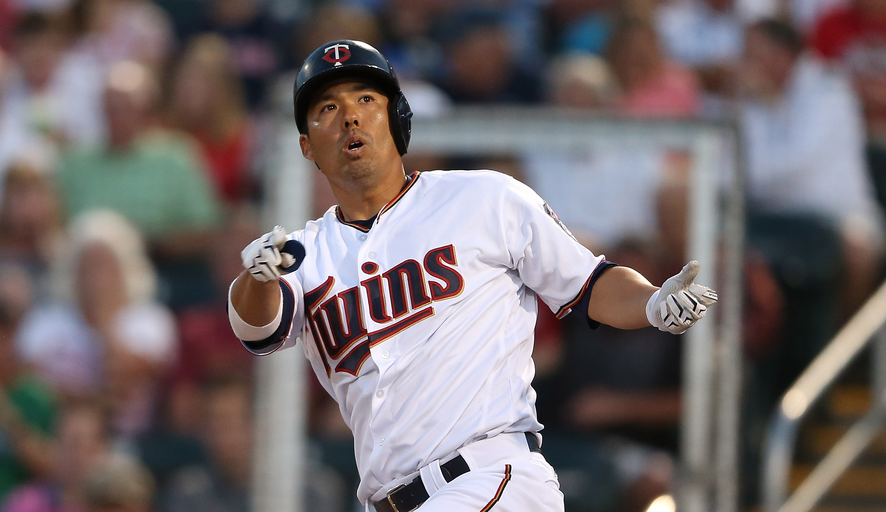 Santana sharp Plouffe and Suzuki homer twice in Twins win