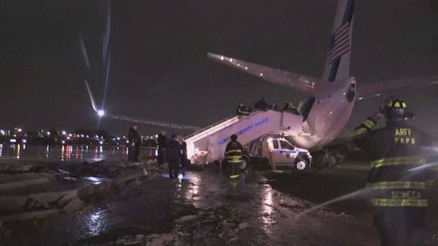 Pence plane skids off runway on rainy...