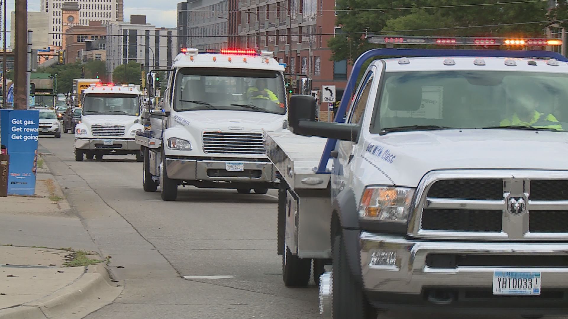 Tow truck procession marks life of